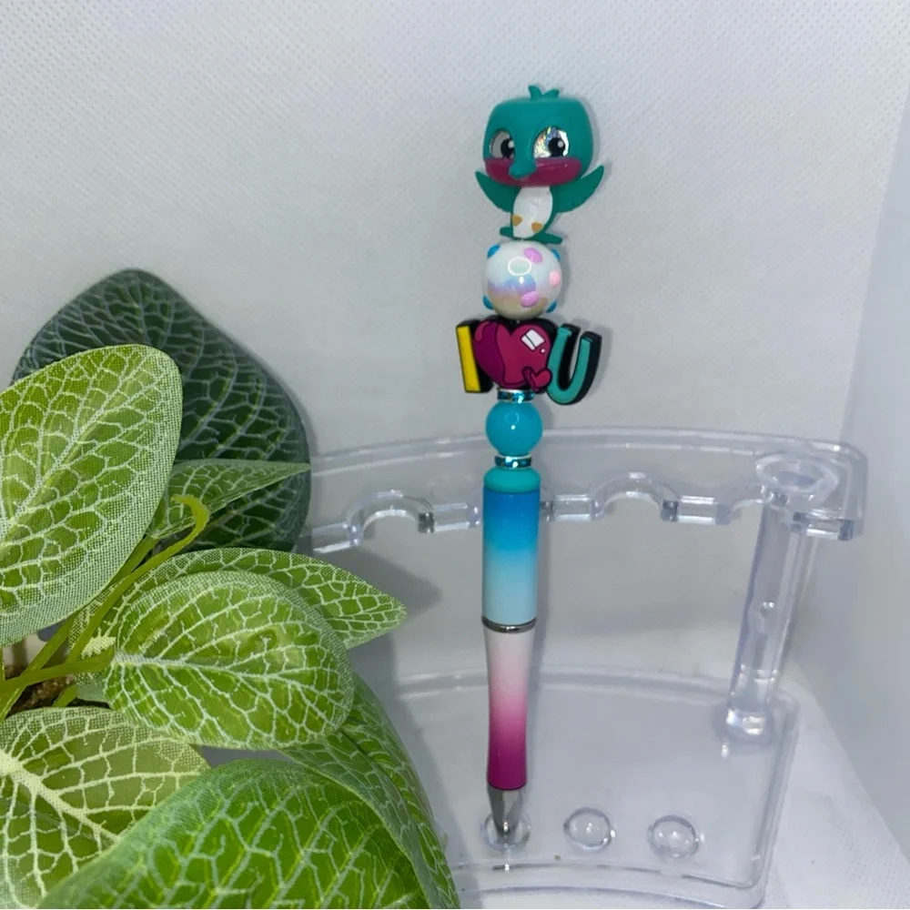 Blue and Green Bird Toy with Round Body and Large Eyes